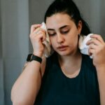 woman sweating indoors