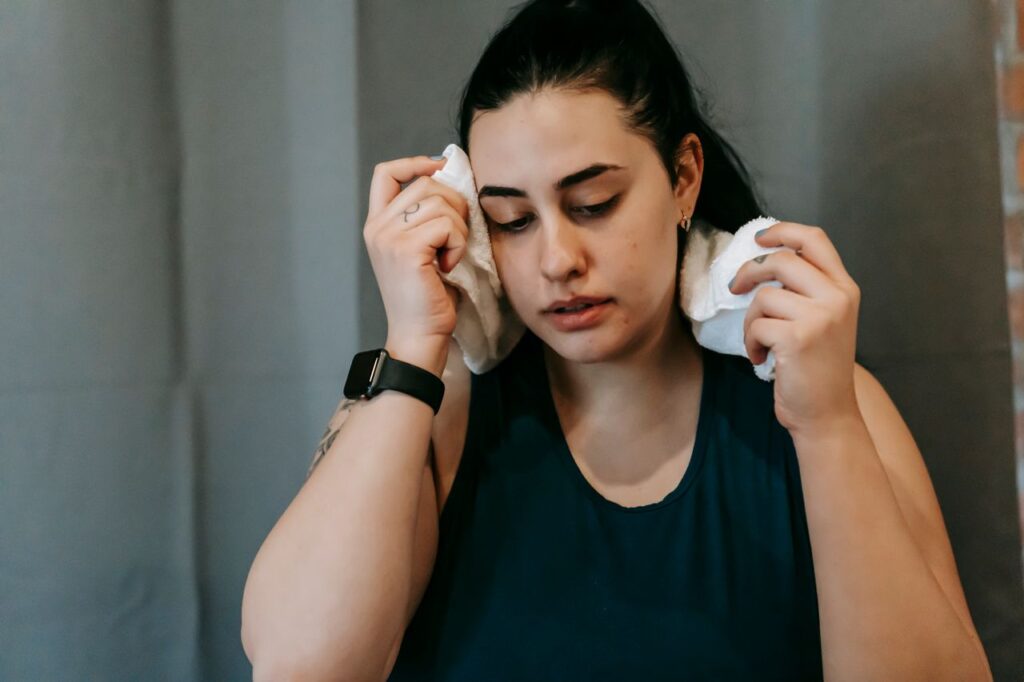 woman sweating indoors